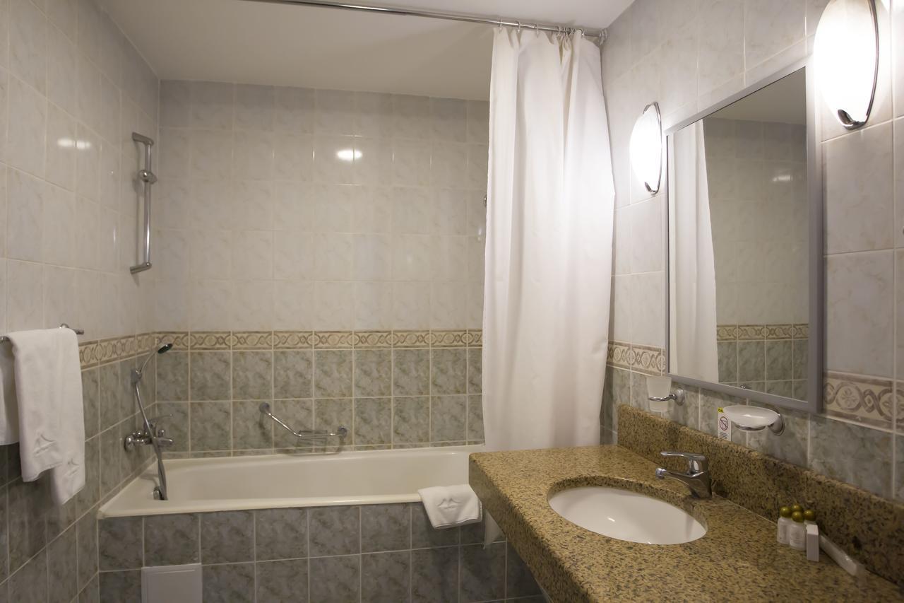 Atyrau Dastan Hotel Екстериор снимка